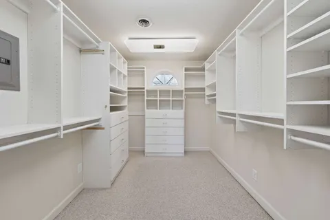 a view of an empty walk in closet