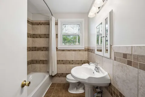 a bathroom with a sink and a bathtub