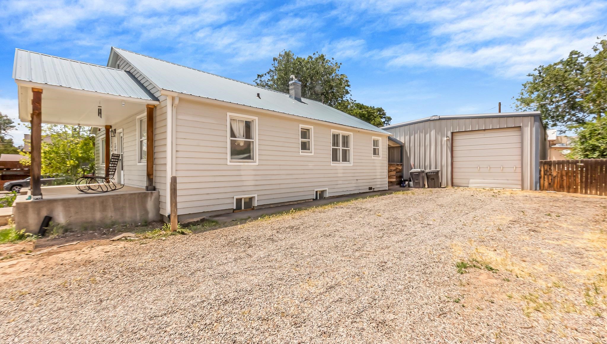208 3rd Street Parachute, CO 81635 - Photo 35 of 40 a front view of a house with a yard