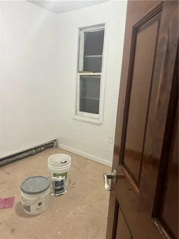 a bathroom with a toilet a sink and a mirror