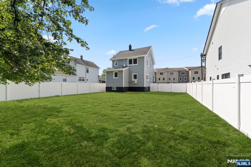 240 Berry Street Hackensack, NJ 07601 - Photo 19 of 25 a view of a house with backyard and garden