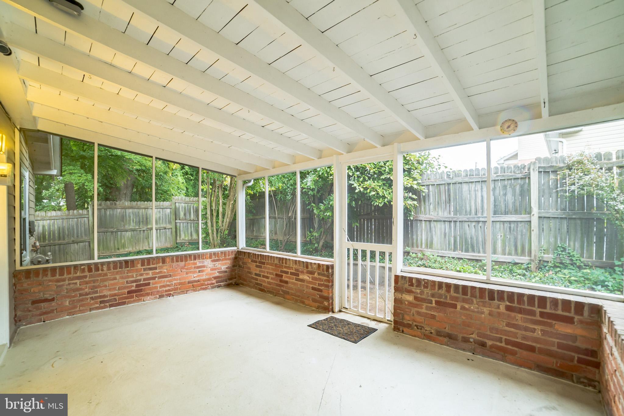 818 Tanley Road Silver Spring, MD 20904 - Photo 11 of 31 Private screened porch off the kitchen