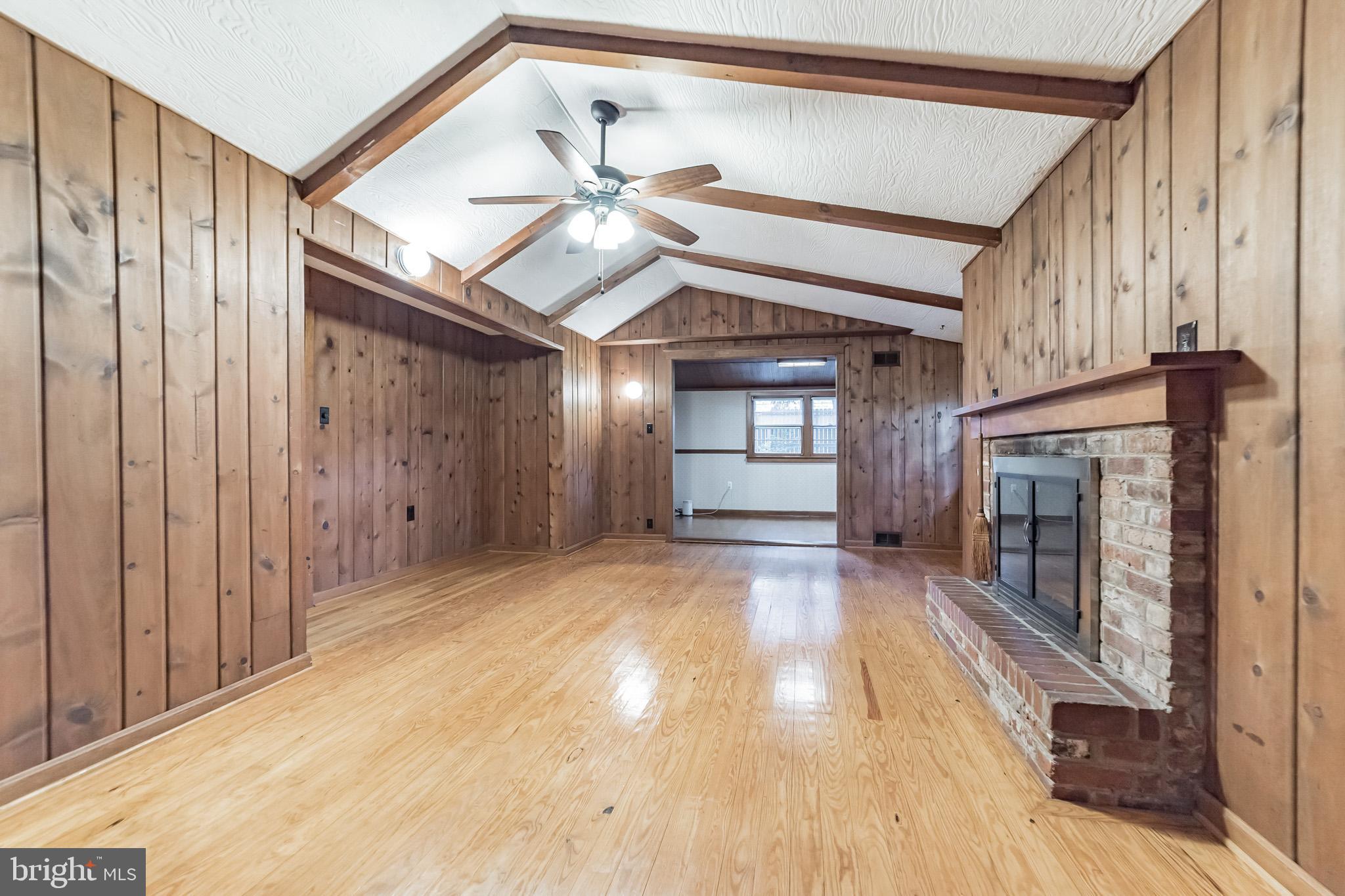 818 Tanley Road Silver Spring, MD 20904 - Photo 5 of 31 Living room with cathedral ceiling
