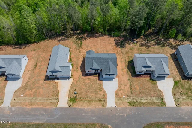 a view of a lake with a yard