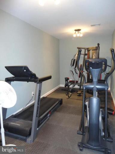 7878 Pembridge Road Manassas, VA 20112 - Photo 3 of 8 Full exercise room or potential wine cellar