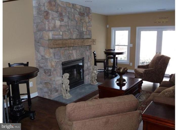 7878 Pembridge Road Manassas, VA 20112 - Photo 7 of 8 Huge rec. room with gas fireplace, media, gym,6th