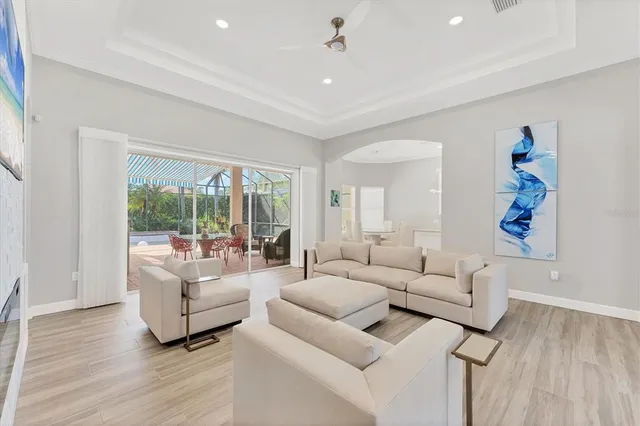 a large kitchen with kitchen island a sink stainless steel appliances and cabinets