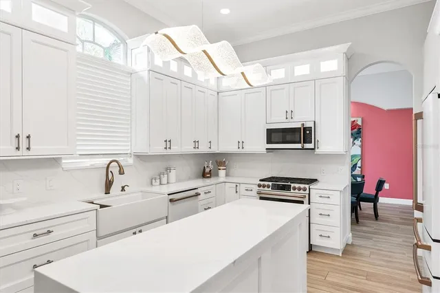 a bedroom with furniture and painting on the wall