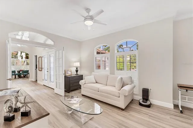 a view of kitchen with furniture and wooden floor