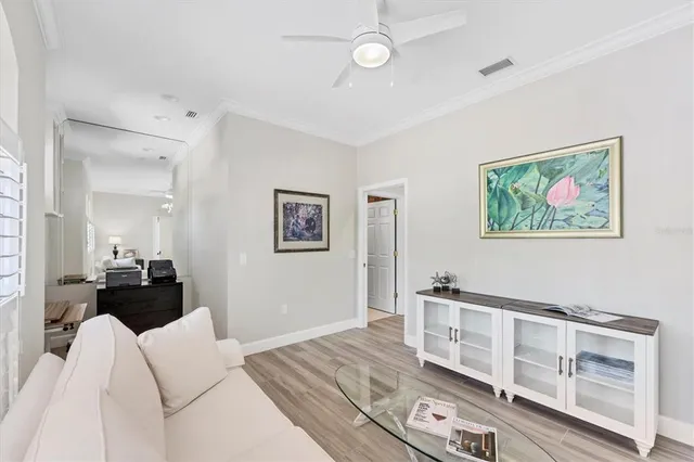 a view of livingroom with furniture and window