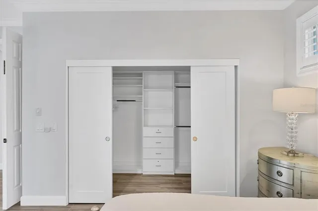 a outdoor space with patio the couches and chairs with wooden floor