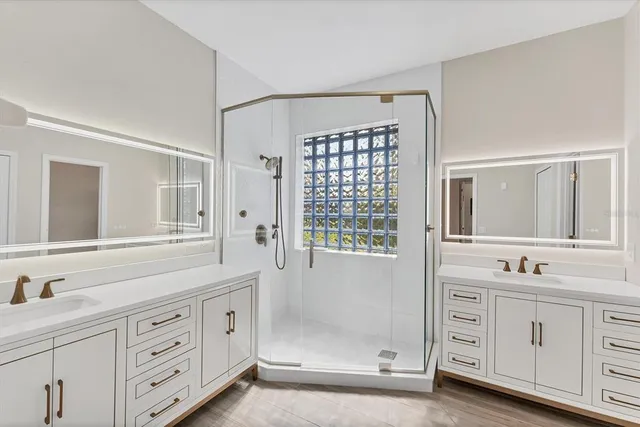 a view of a patio with a dining table and chairs