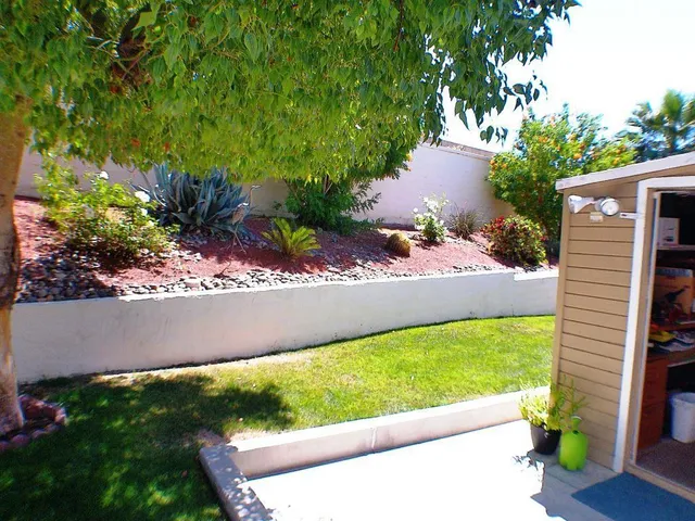 a view of a back yard of the house