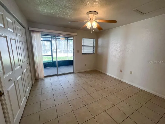 en empty room with windows