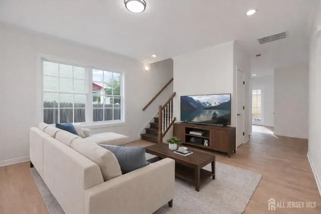 aerial view of a house with table and chairs