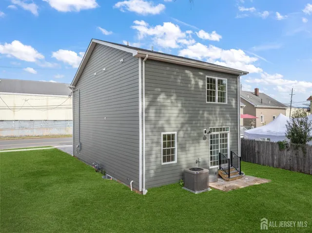 a backyard of a house with seating space