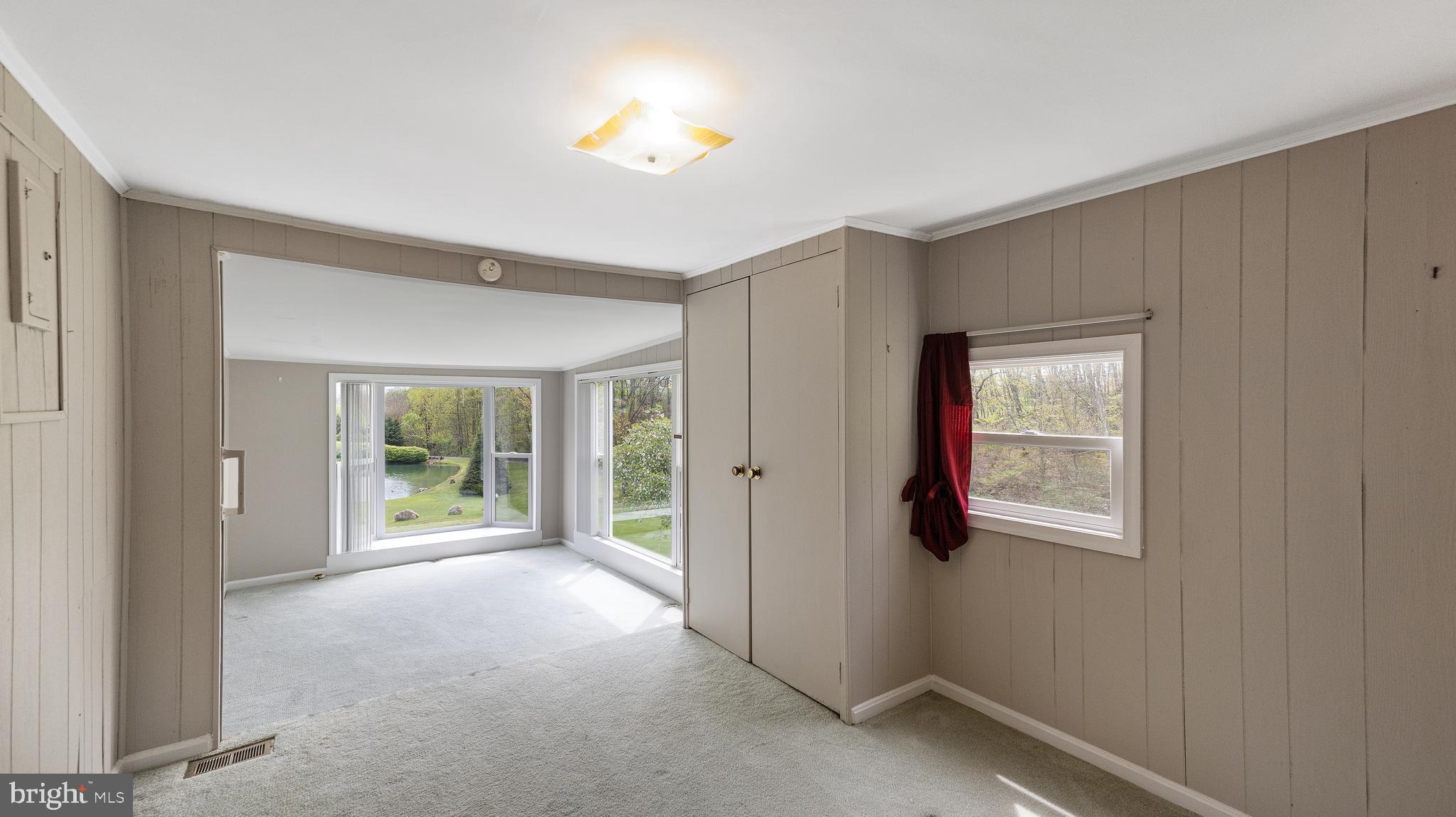 3010 Basford Road Frederick, MD 21703 - Photo 32 of 64 primary BR suite w/ sitting room overlooking pond
