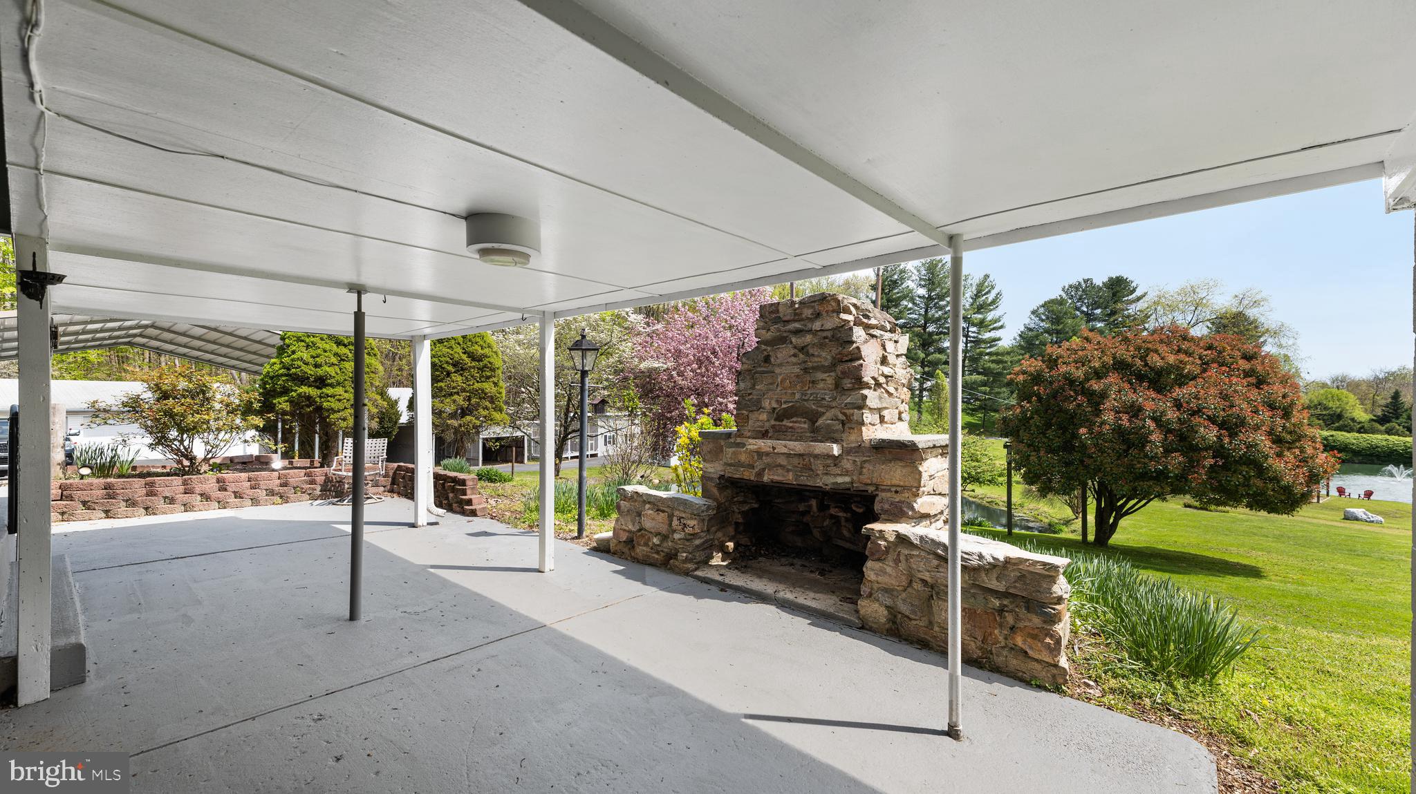 3010 Basford Road Frederick, MD 21703 - Photo 48 of 64 patio and fireplace
