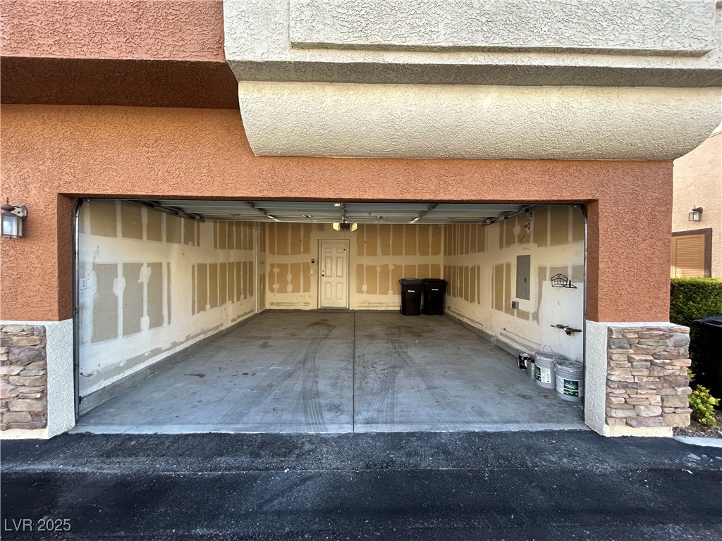 9303 Gilcrease Avenue, Unit 1131 Las Vegas, NV 89149 - Photo 27 of 36 View of garage