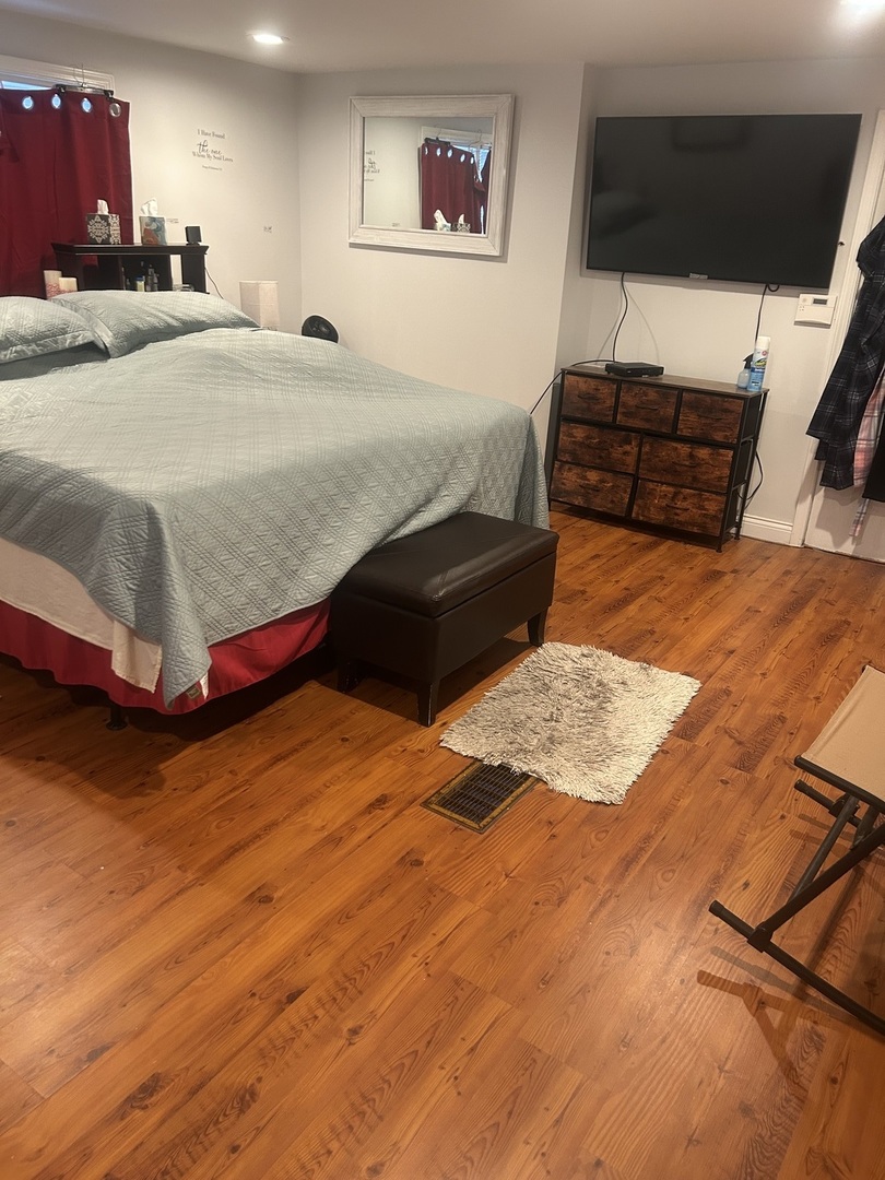 2816 West 85th Street Chicago, IL 60652 - Photo 12 of 22 a bedroom with a bed and a window