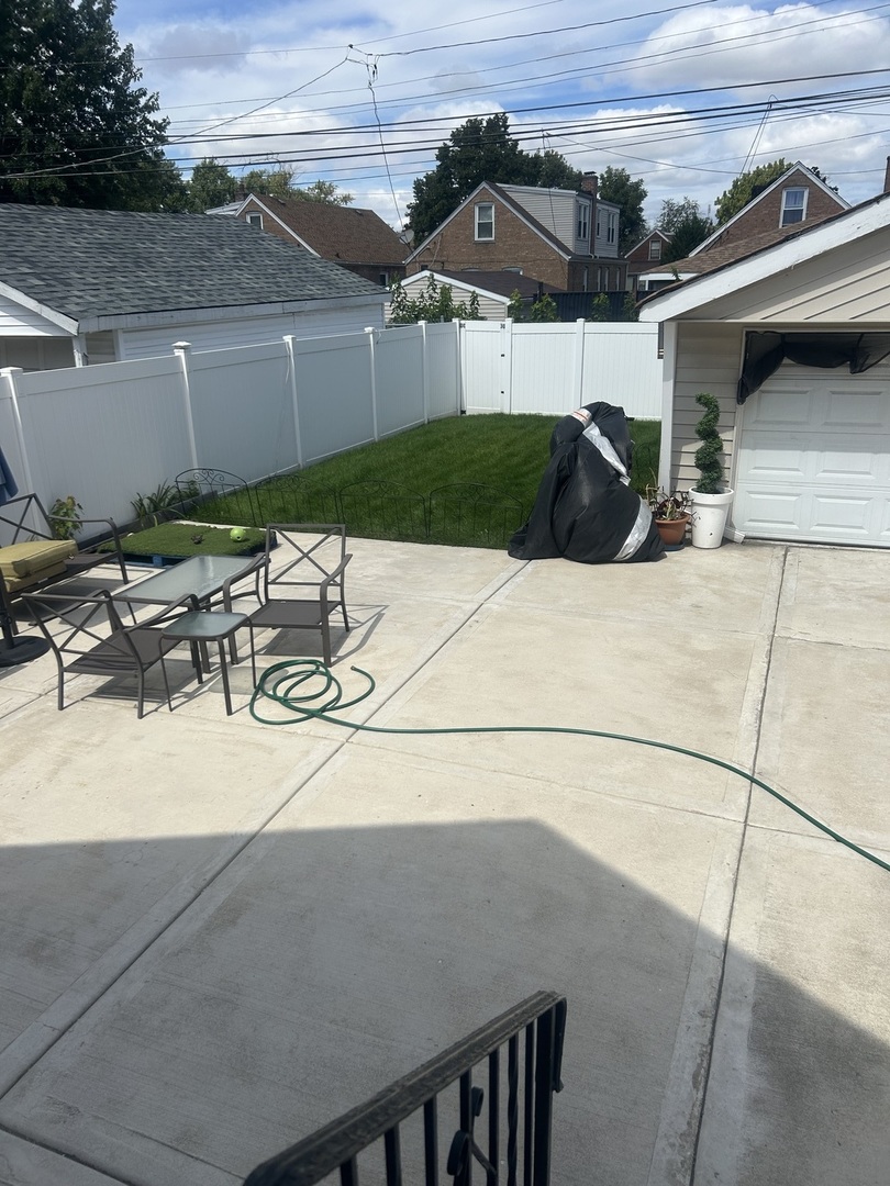 2816 West 85th Street Chicago, IL 60652 - Photo 22 of 22 a view of backyard with outdoor seating and city view