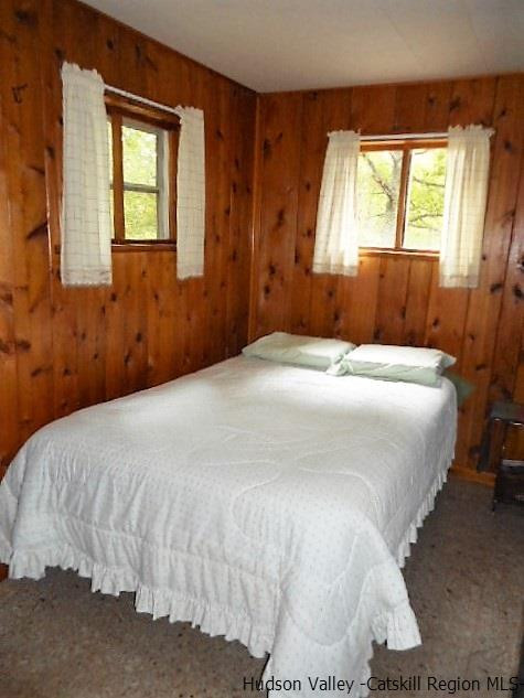 15 Belleayre Ridge Arkville, NY 12406 - Photo 19 of 27 a bedroom with a bed and a window