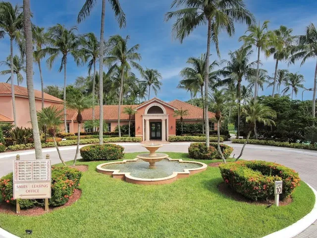 a swimming pool with outdoor seating and yard