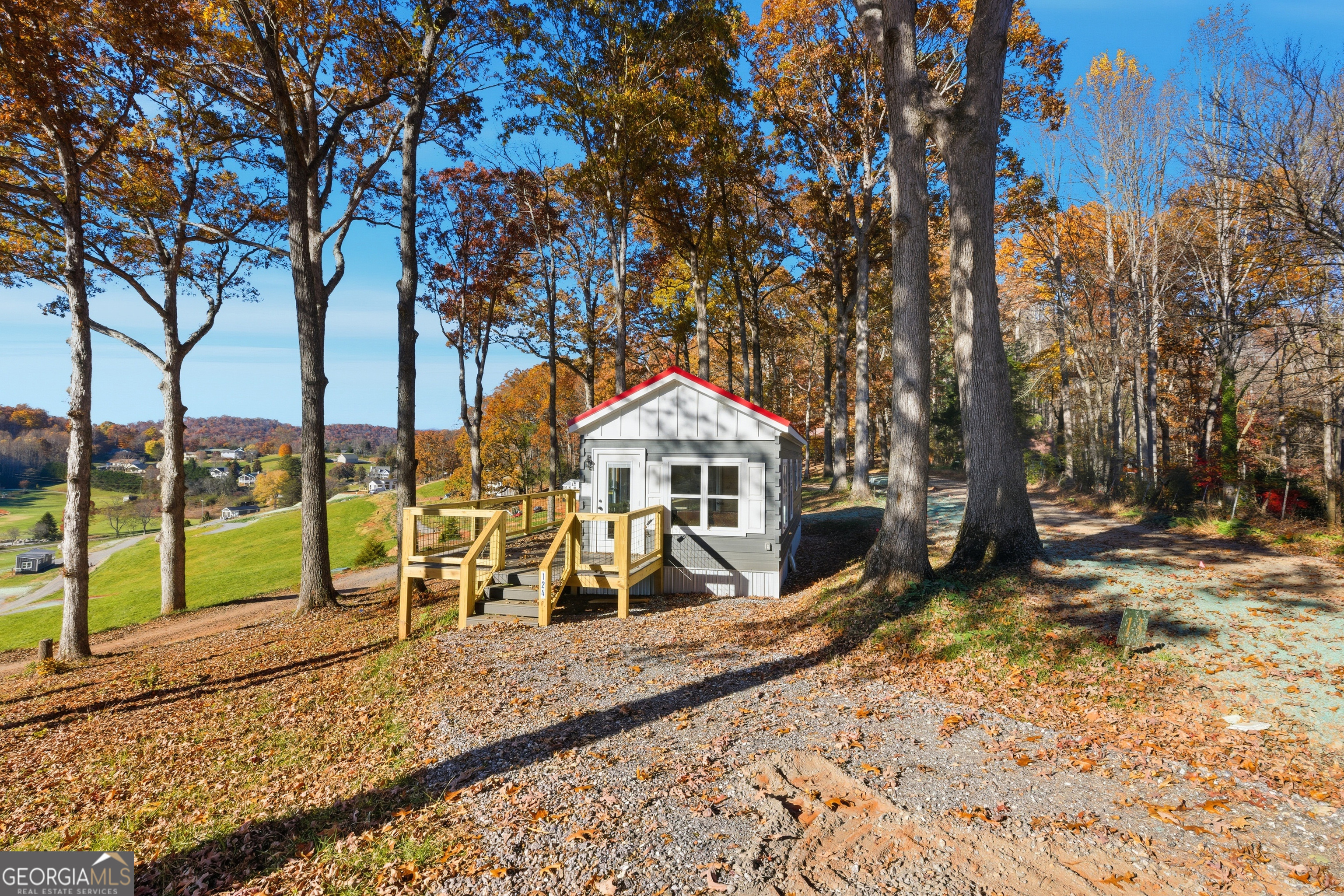 527 Saunders Road Franklin, NC 28734 - Photo 3 of 19 a view of a park with iron fence