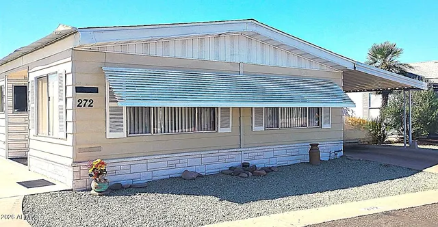 a front view of a house with garage