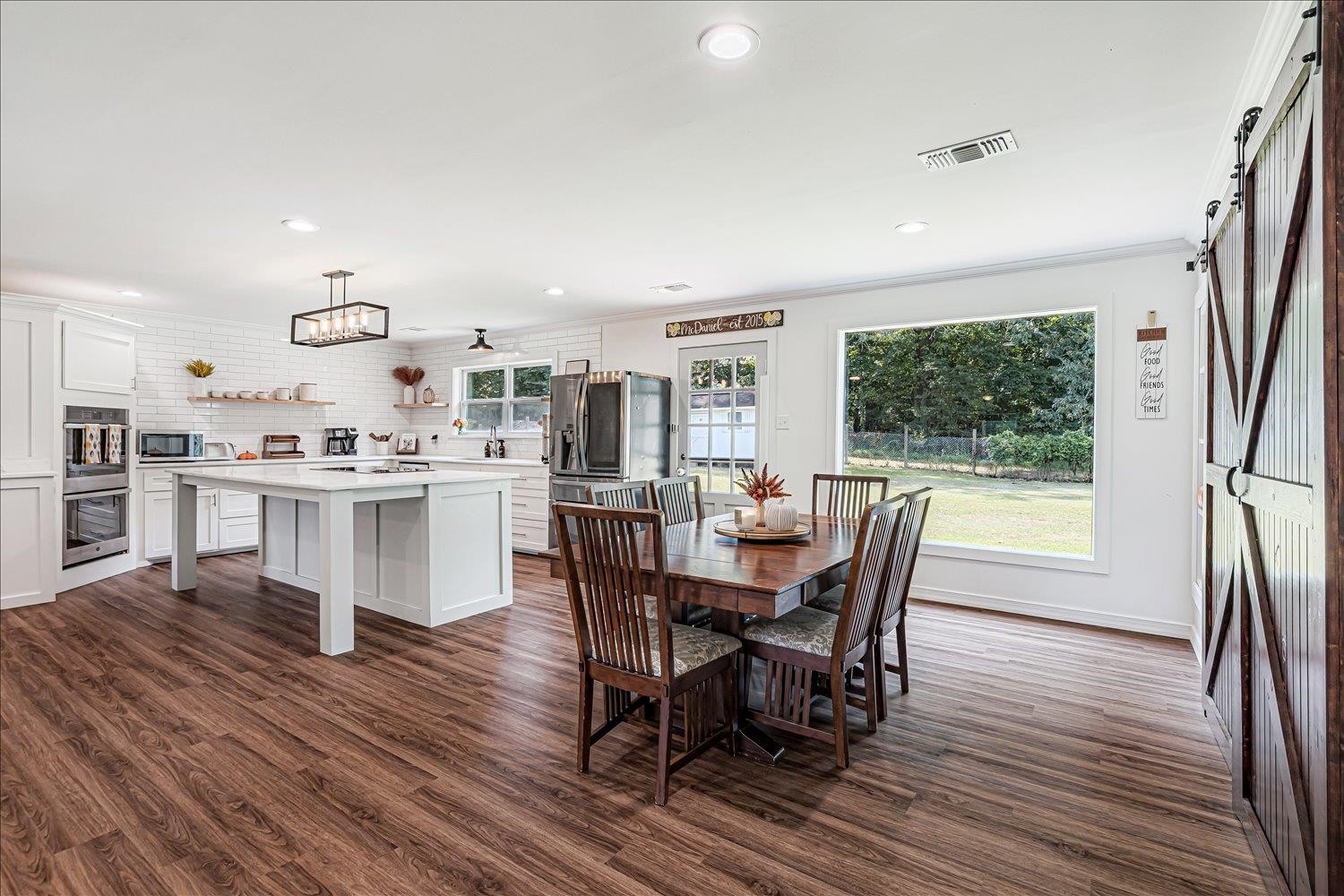 8159 Epperson Mill Road Millington, TN 38053 - Photo 11 of 31 a dining room with furniture and wooden floor