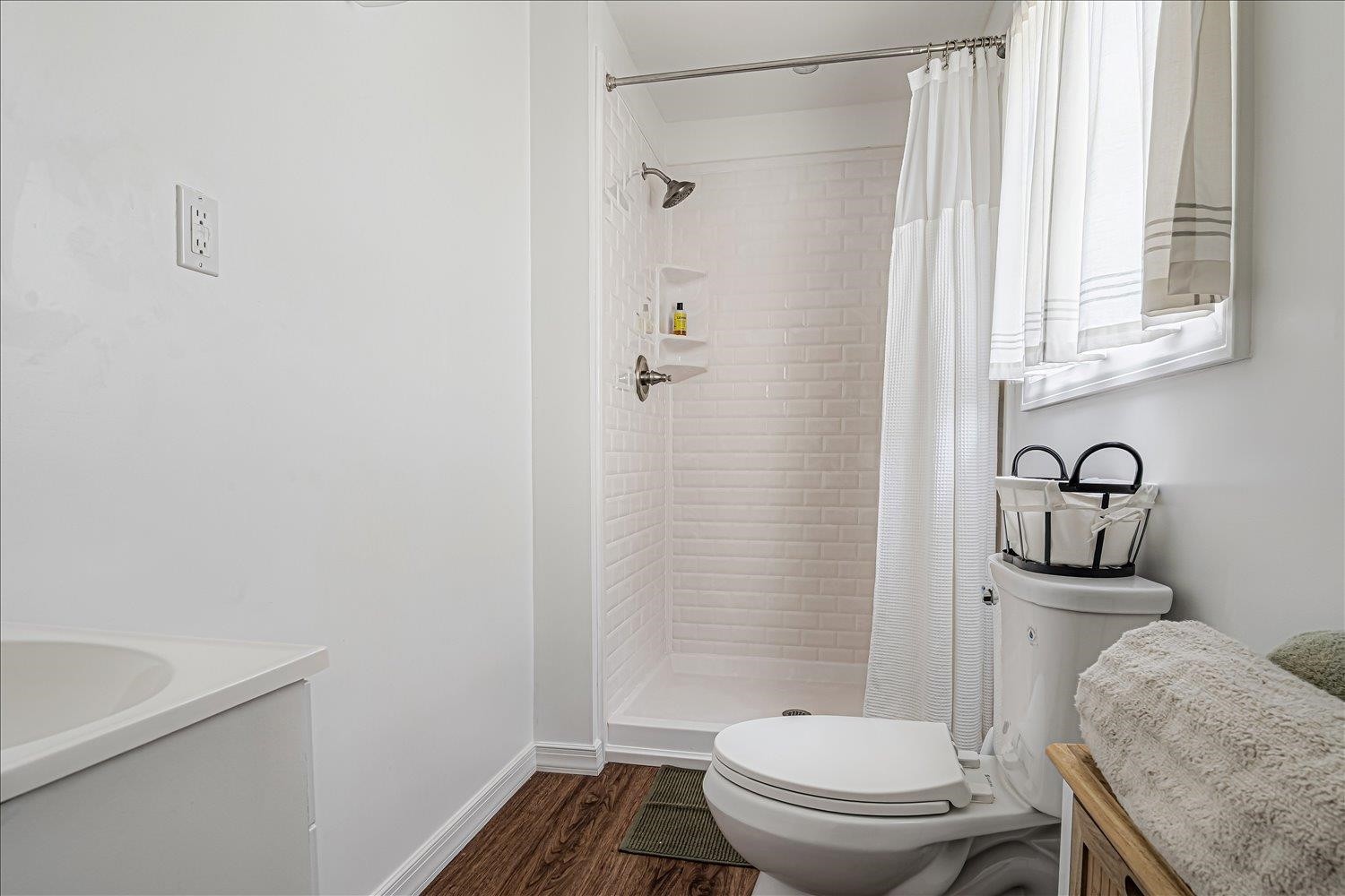 8159 Epperson Mill Road Millington, TN 38053 - Photo 21 of 31 a bathroom with a granite countertop sink toilet and shower