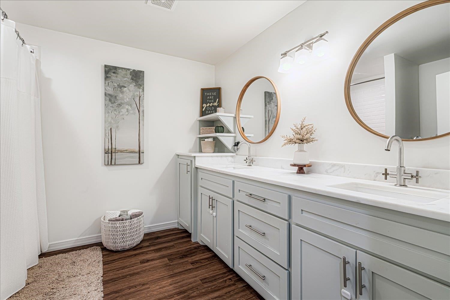 8159 Epperson Mill Road Millington, TN 38053 - Photo 23 of 31 a bathroom with a double vanity sink and a mirror