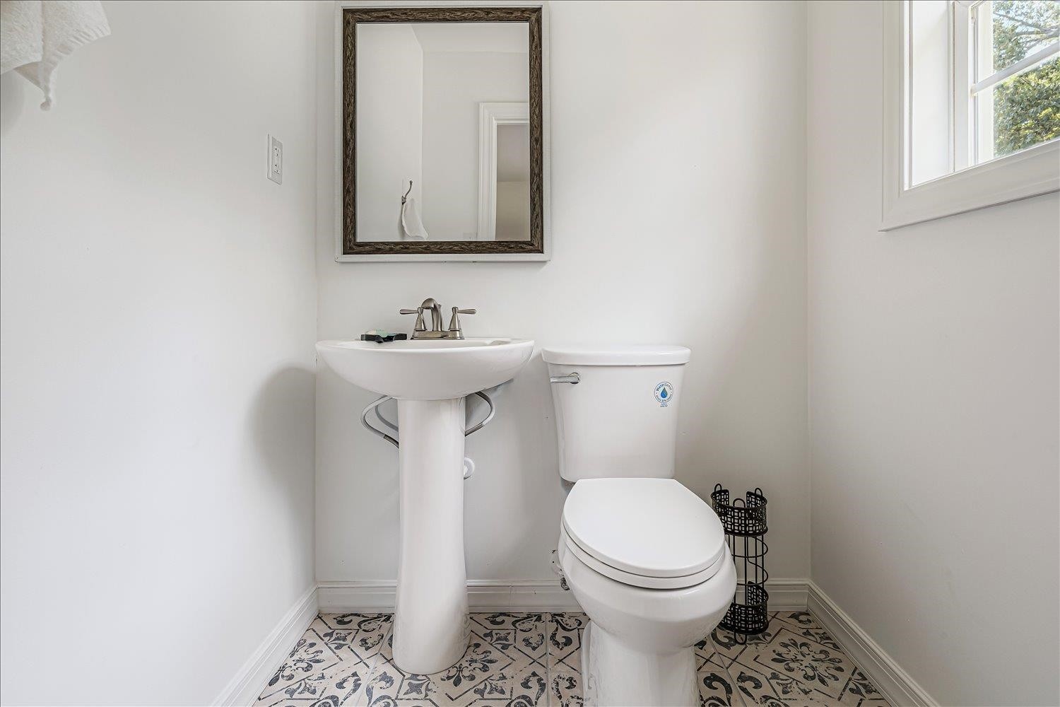 8159 Epperson Mill Road Millington, TN 38053 - Photo 26 of 31 a bathroom with a toilet sink and mirror