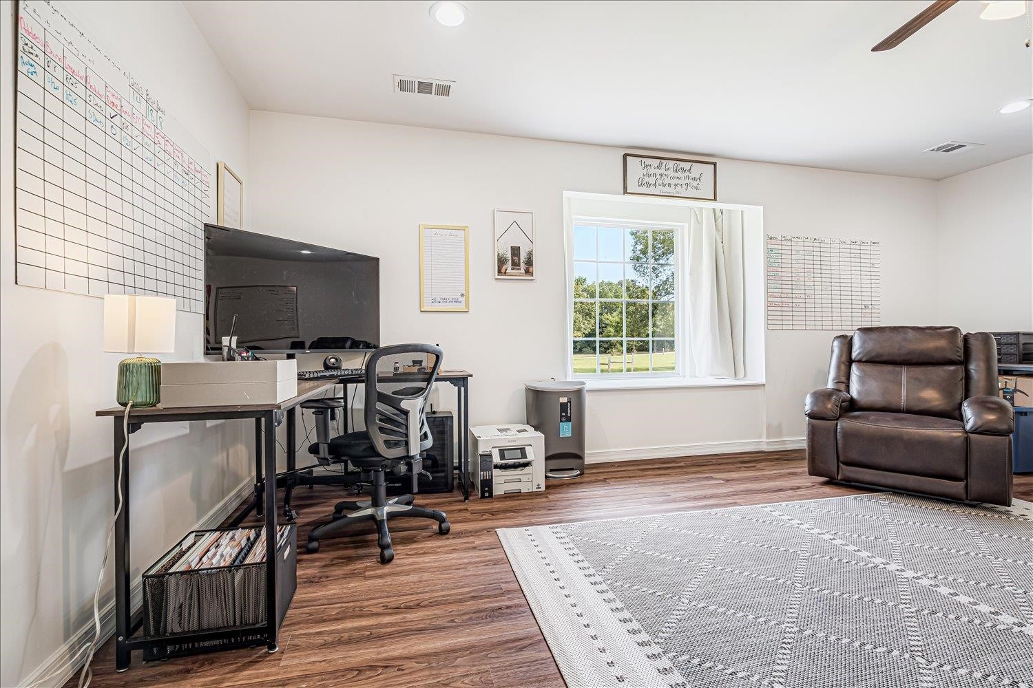 8159 Epperson Mill Road Millington, TN 38053 - Photo 28 of 31 a living room with furniture and a flat screen tv