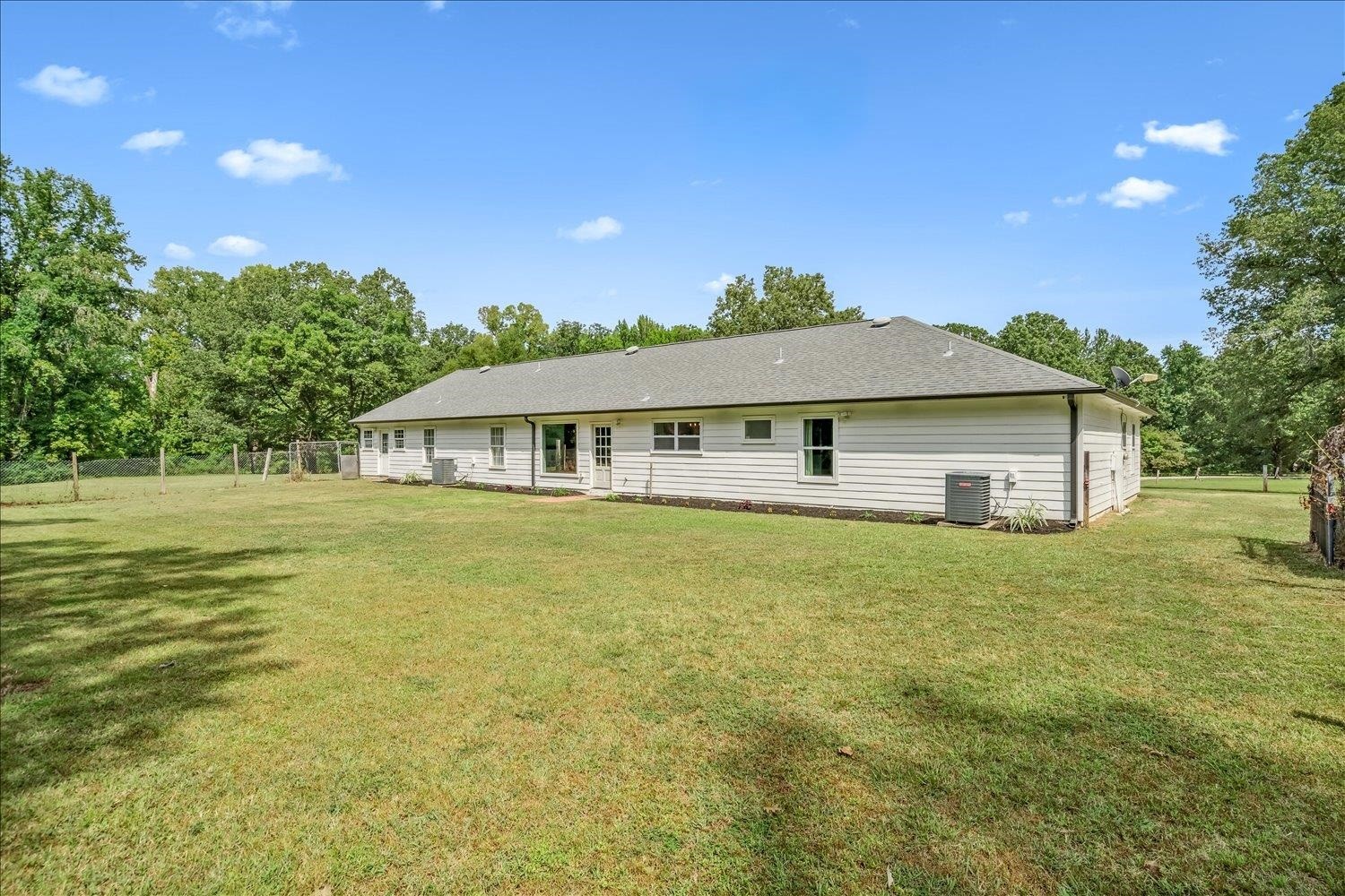 8159 Epperson Mill Road Millington, TN 38053 - Photo 30 of 31 a front view of a house with a garden