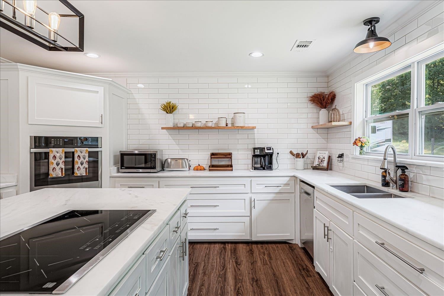 8159 Epperson Mill Road Millington, TN 38053 - Photo 8 of 31 a kitchen with cabinets a sink and appliances