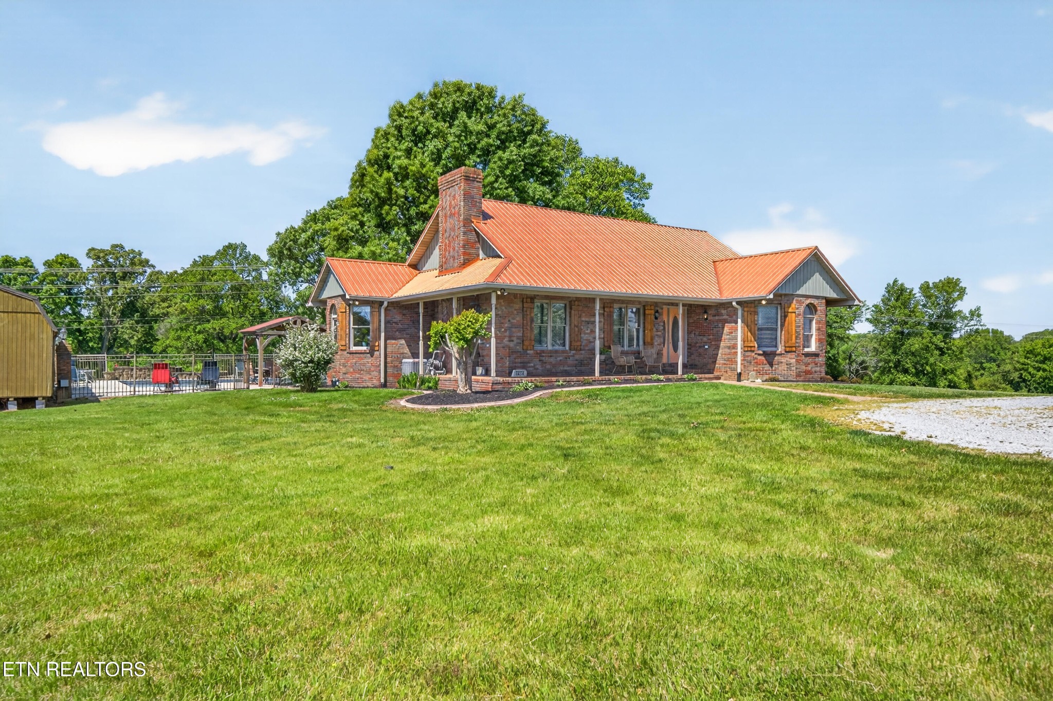 4015 Baxter Road Baxter, TN 38544 - Photo 1 of 48 a view of house with garden