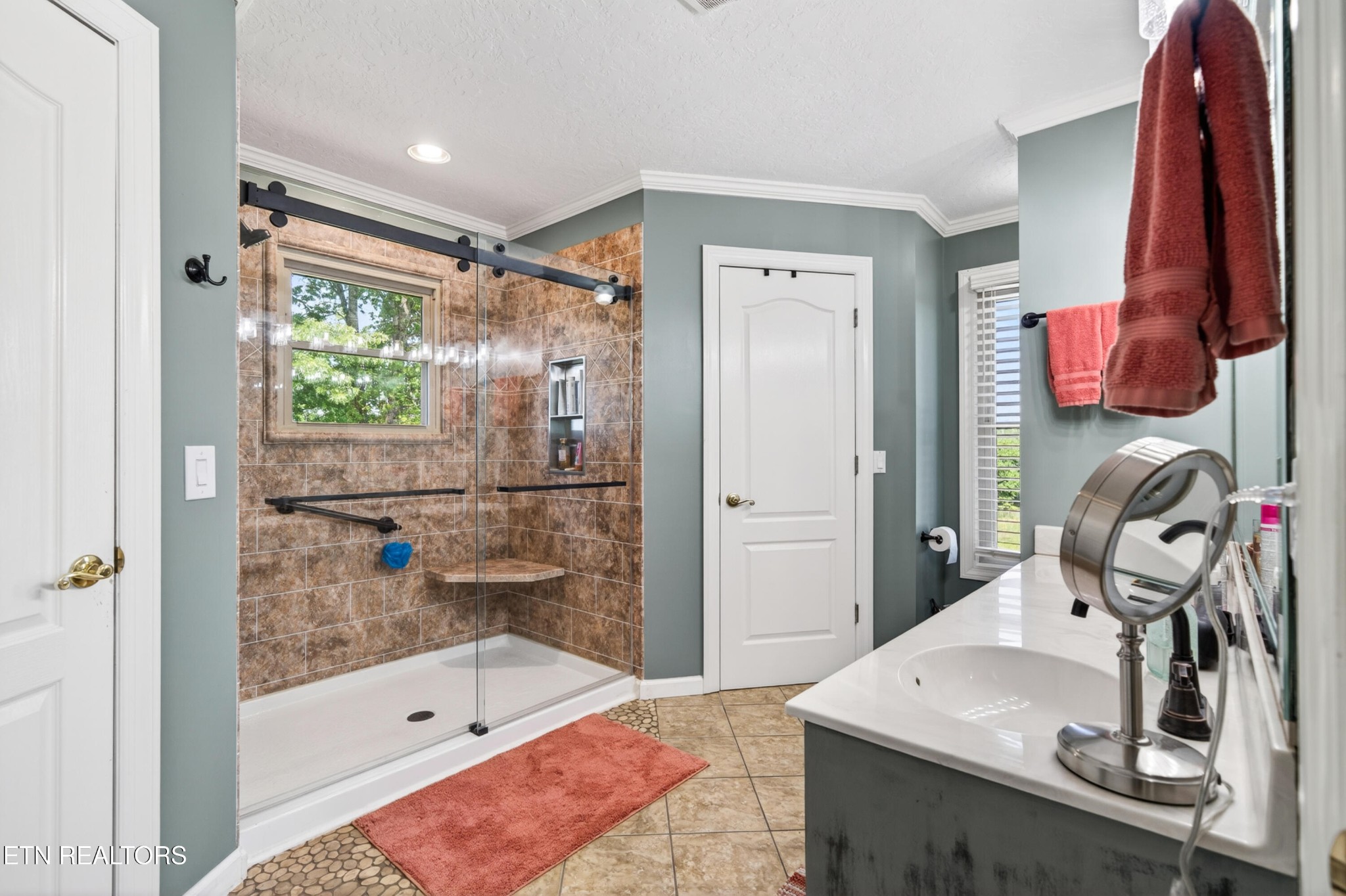 4015 Baxter Road Baxter, TN 38544 - Photo 20 of 48 a bathroom with a sink and a bathtub