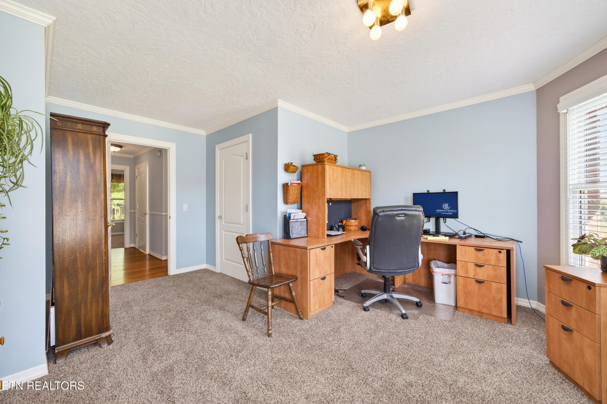 4015 Baxter Road Baxter, TN 38544 - Photo 24 of 48 a view of a workspace with furniture and a window