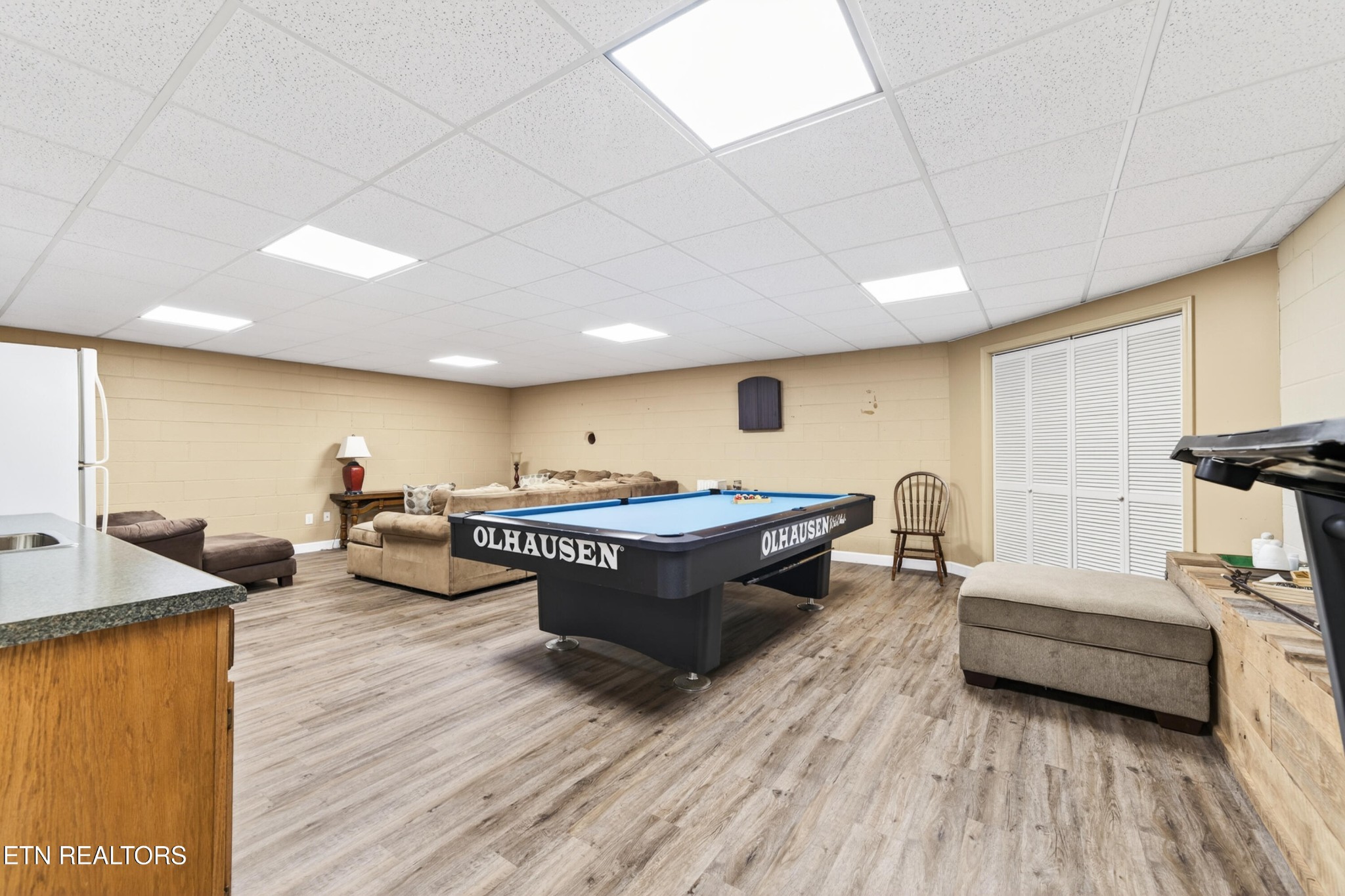 4015 Baxter Road Baxter, TN 38544 - Photo 28 of 48 a living room with furniture and a wooden floor