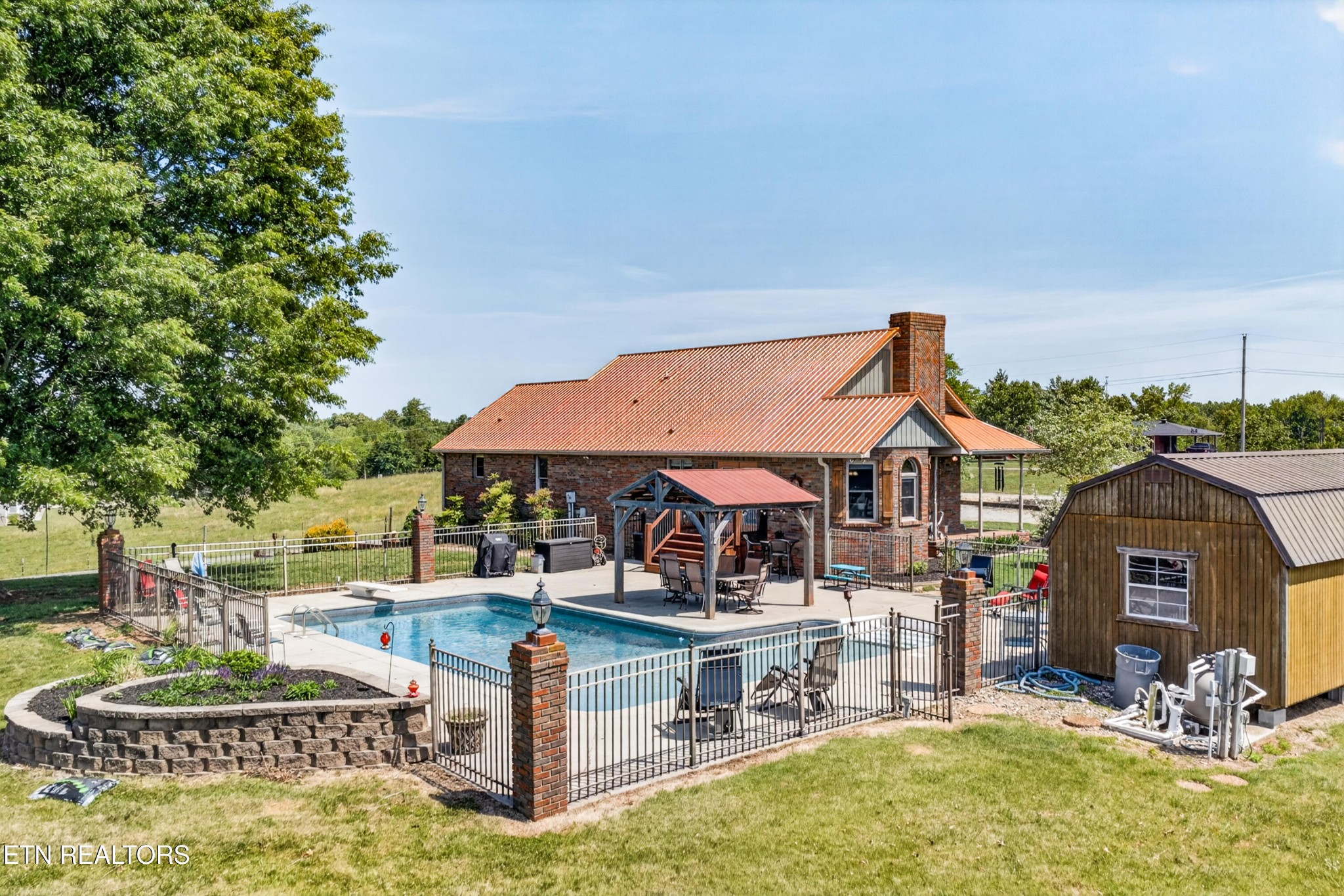4015 Baxter Road Baxter, TN 38544 - Photo 4 of 48 a view of a house with swimming pool and sitting area