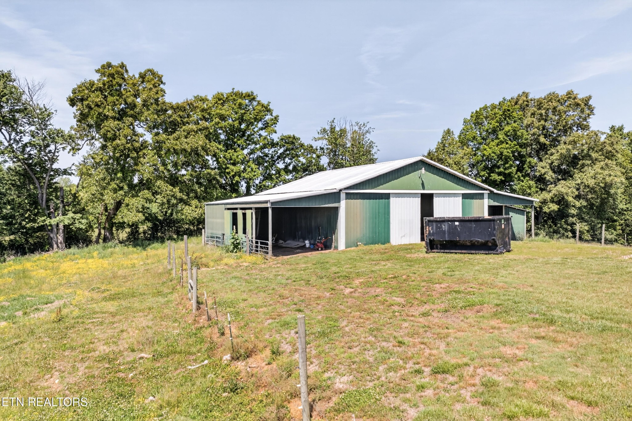 4015 Baxter Road Baxter, TN 38544 - Photo 42 of 48 a house with trees in the background