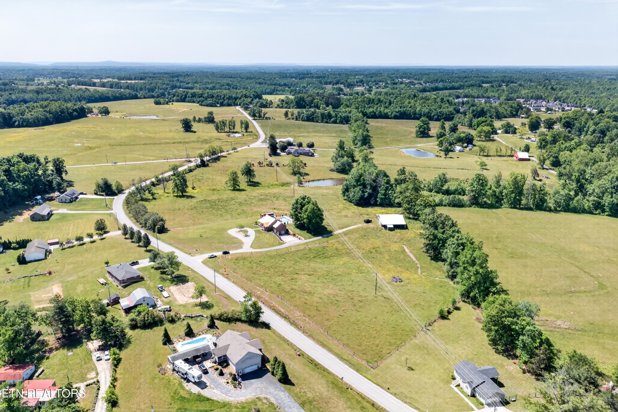 4015 Baxter Road Baxter, TN 38544 - Photo 44 of 48 an aerial view of a house with a lake view