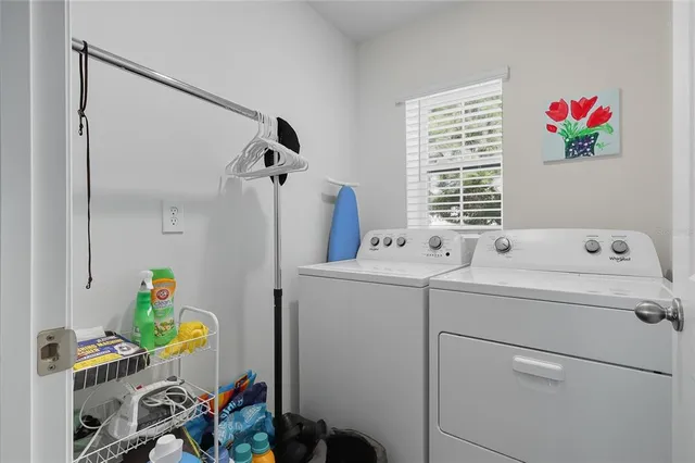 a utility room with dryer and washer