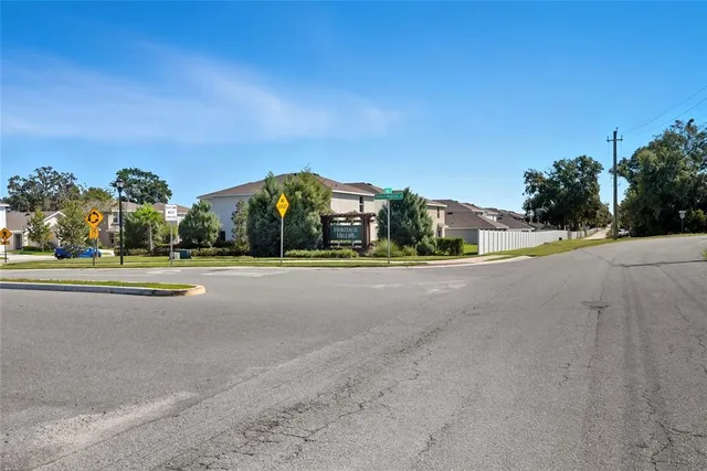 a view of street with houses