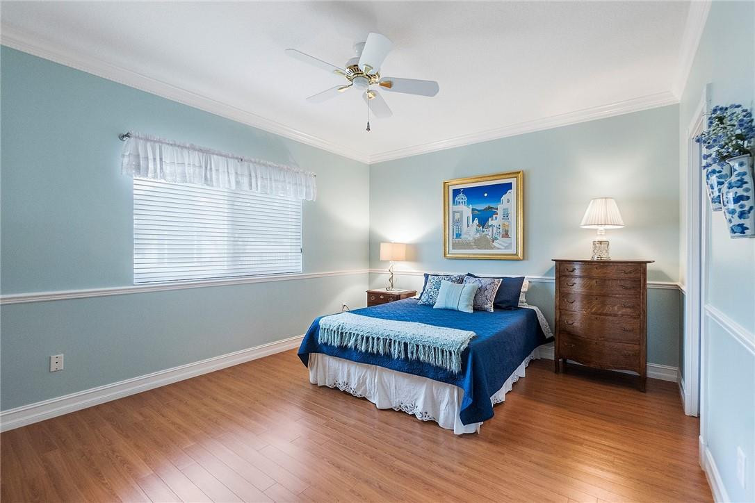 10324 Southwest 26th Street Davie, FL 33324 - Photo 19 of 37 a living room with a bed furniture and a window