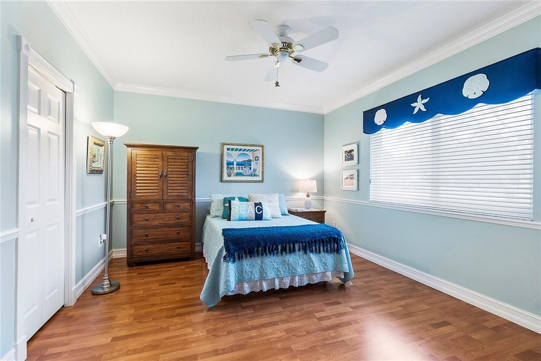 10324 Southwest 26th Street Davie, FL 33324 - Photo 22 of 37 a bedroom with a bed and a window
