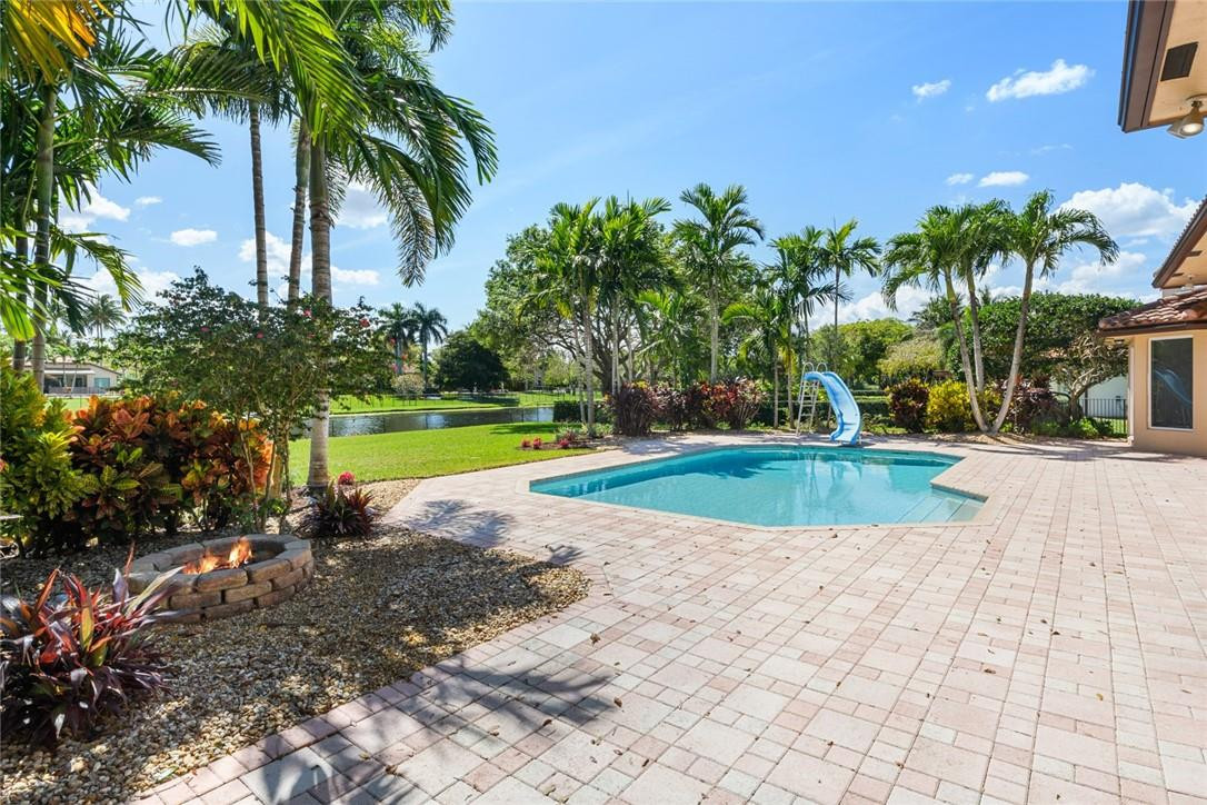 10324 Southwest 26th Street Davie, FL 33324 - Photo 28 of 37 a view of a backyard