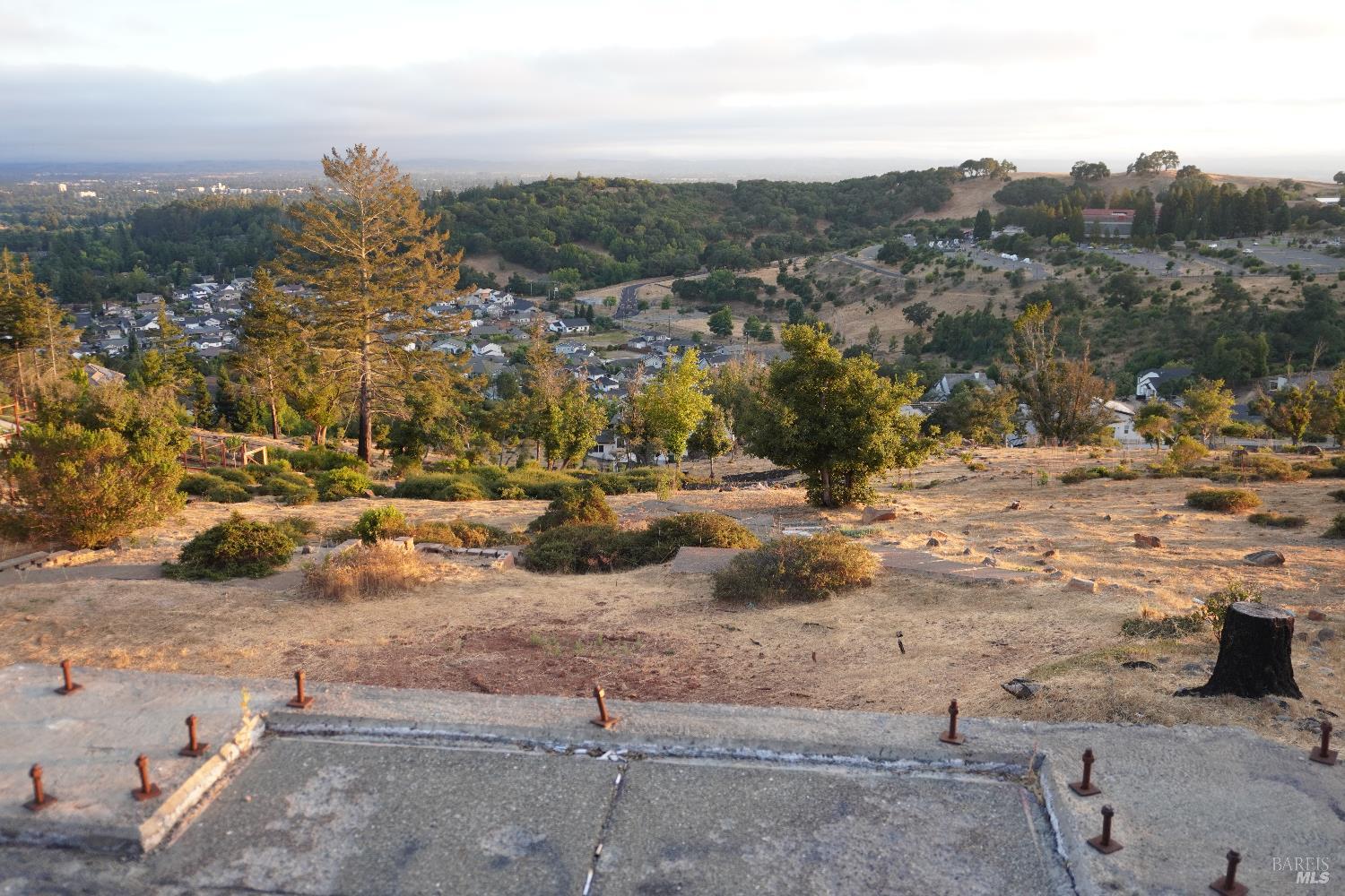 3638 Bellagio Court Santa Rosa, CA 95404 - Photo 2 of 25 a view of a town with mountains in the background