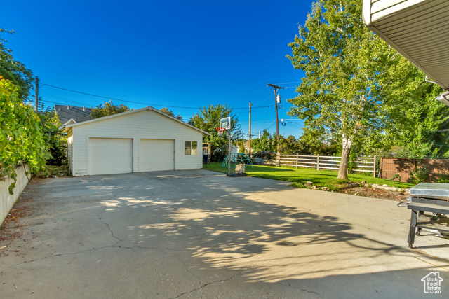 360 East Center Street Centerville, UT 84014 - Photo 9 of 41 View of side of property with an outbuilding and a detached garage